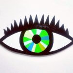 A green and blue eye by Martha Rich